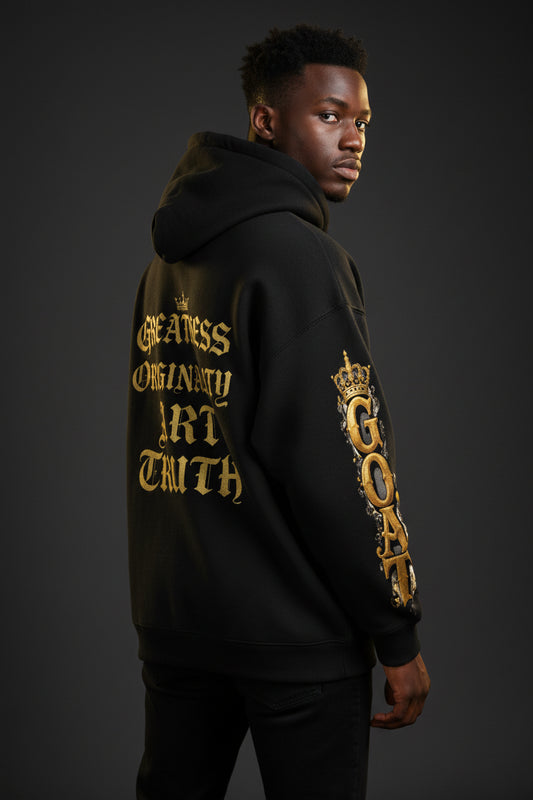 Black oversized fleece hoodie on model, sleeve graphic and back text "Art Truth"