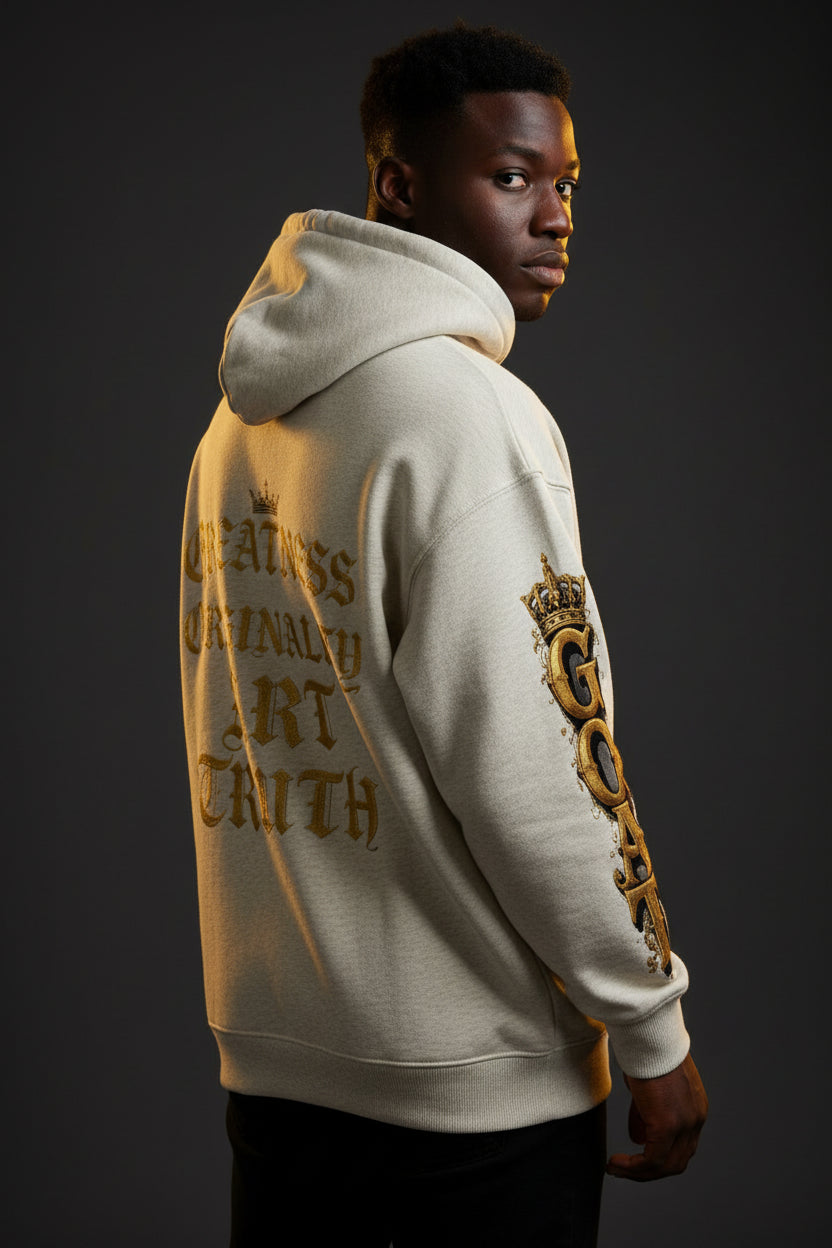 Oversized fleece hoodie in light beige, side view with large sleeve graphic