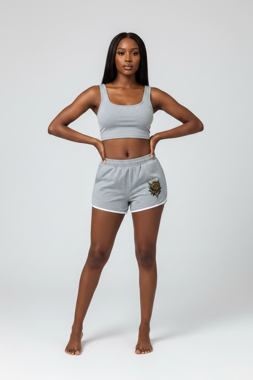Light gray women's retro shorts with contrast black trim and embroidered patch
